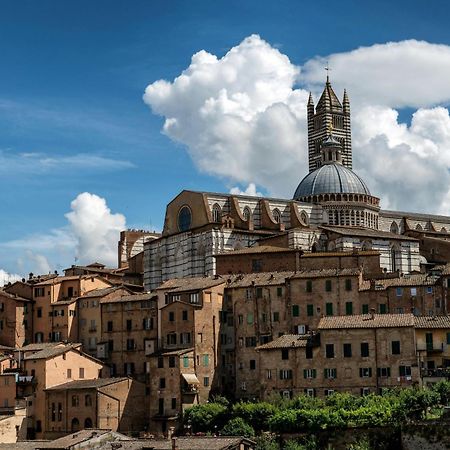 Ferienwohnung Asso Di Picche Siena Exterior foto