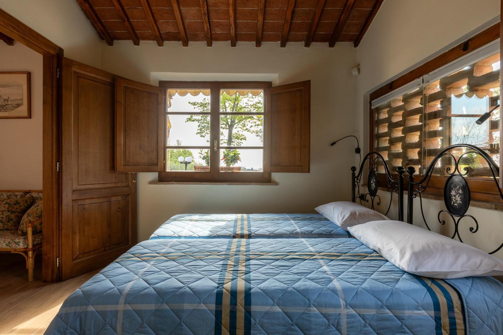Ferienwohnung Asso Di Picche Siena Exterior foto